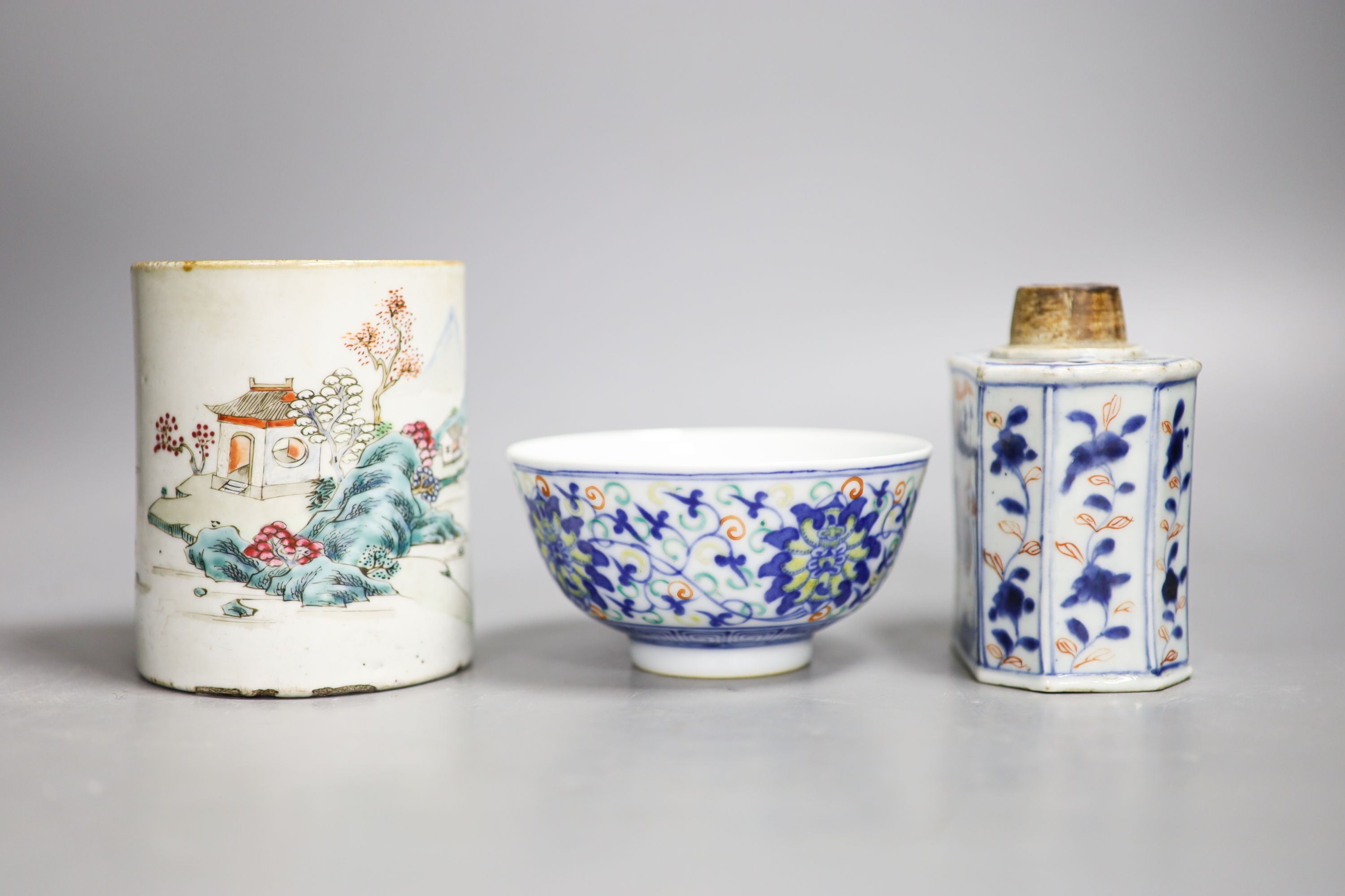 A Chinese famille rose mug, a Chinese Imari tea caddy and a doucai bowl, 18th century and later